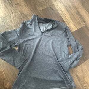 Nike Women’s Dri-FIT Superset Heathered 1/4 Zip Training Top - Dark Gray